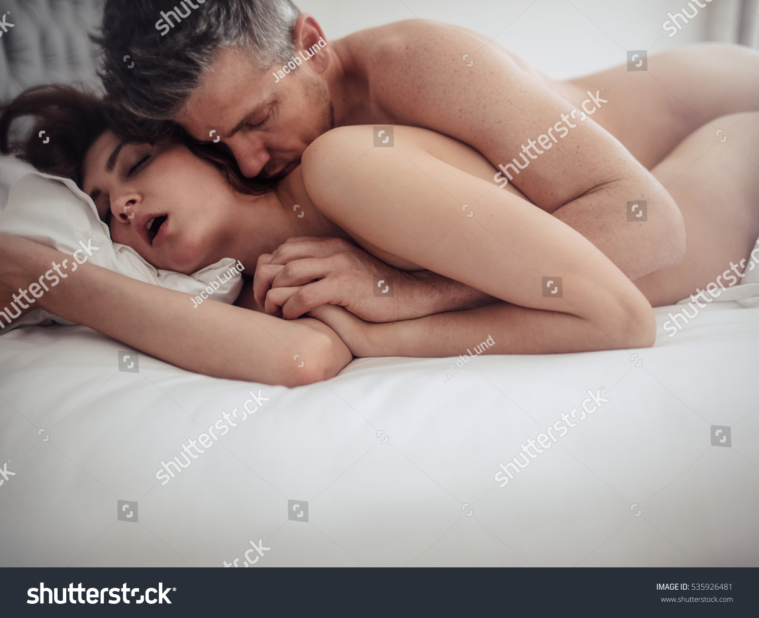 Nude family having sex