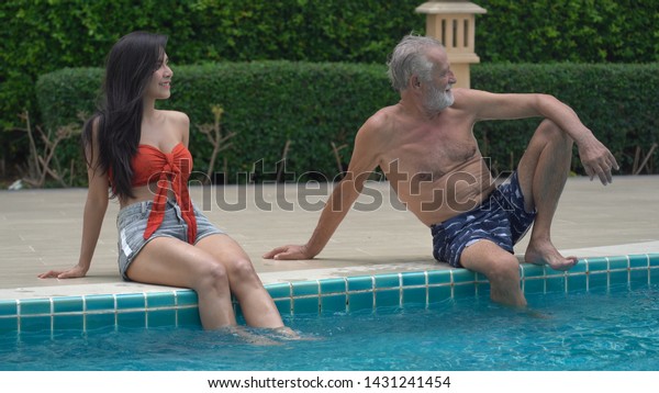 Sexy girl and old man