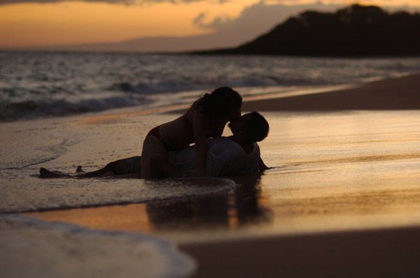 Romantic couple making love on the beach
