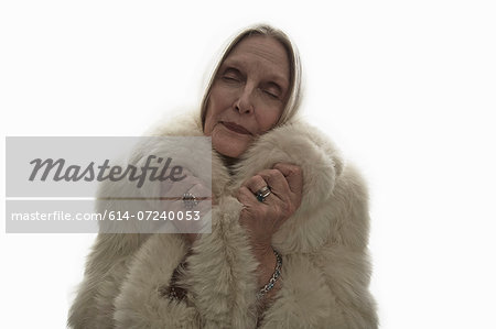 Mature woman in fur