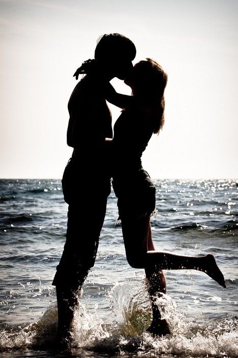 Romantic couple making love on the beach