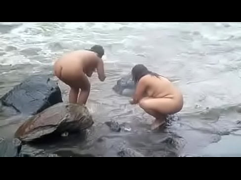 Naked indian women bathing in river