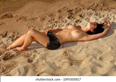 Beautiful naked women on beach