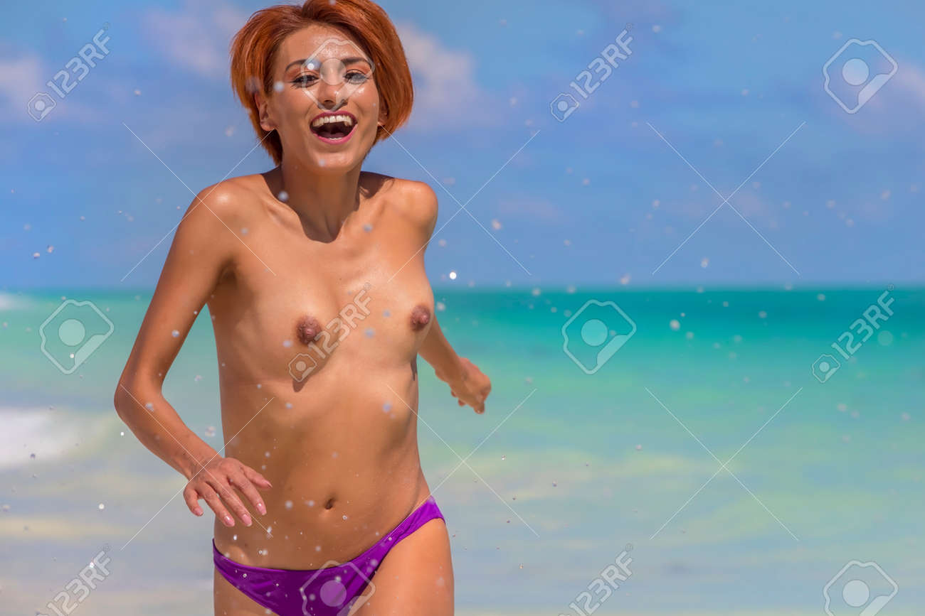 Nude model in beach