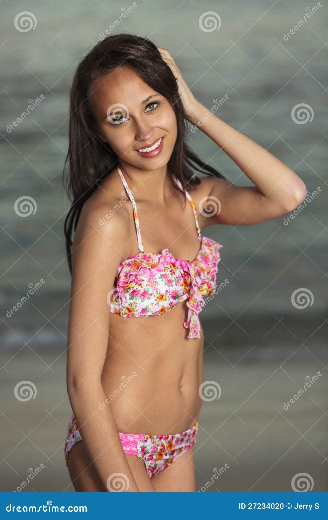 Cute brunette teen girls in bikinis