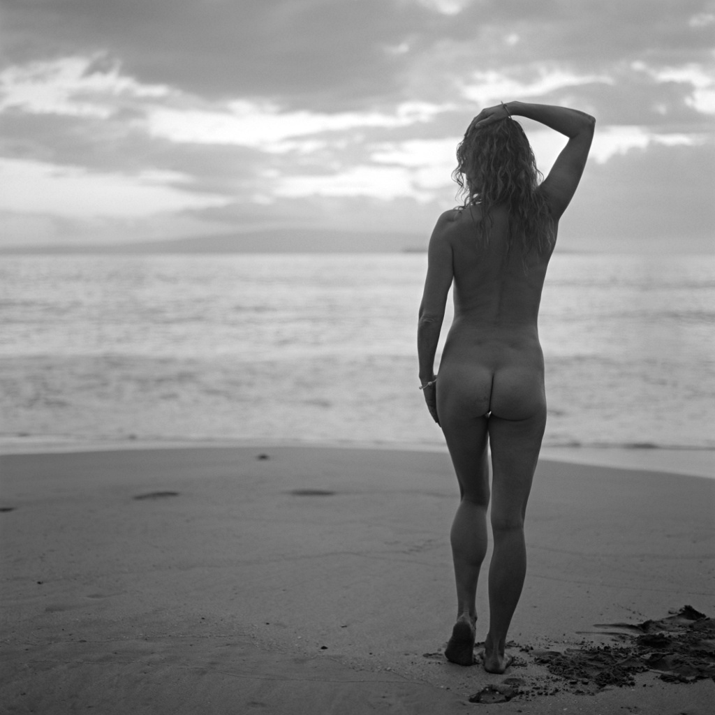 Nude model in beach