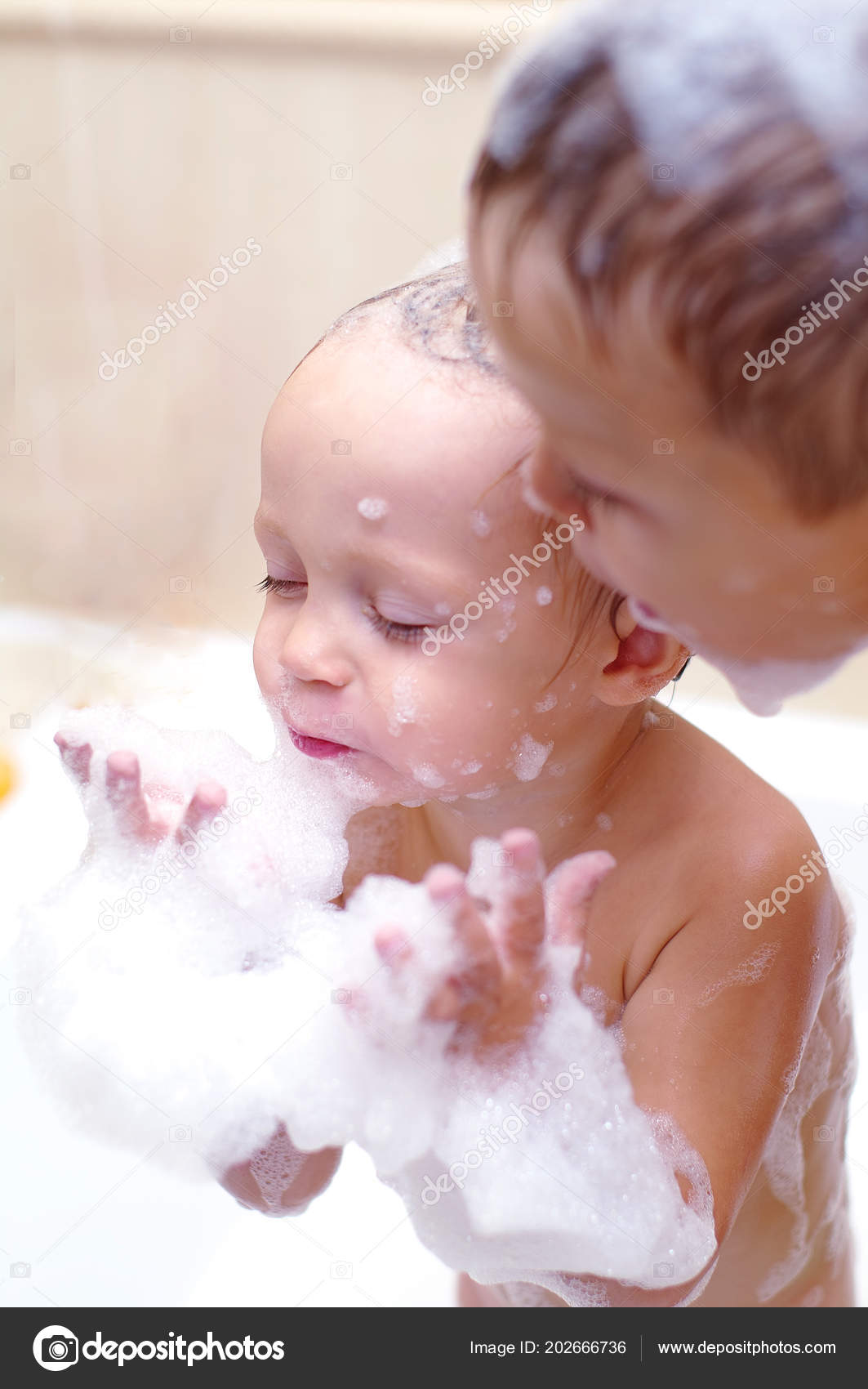 Girls and boys taking baths